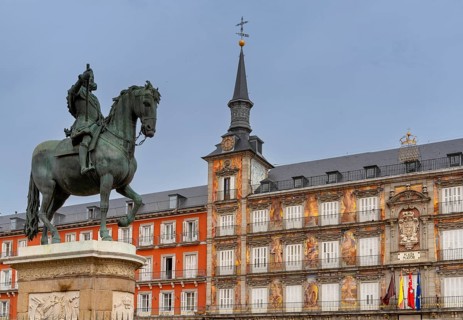 Madrid, Spain, 6 April, 2024: statue of Felipe II and the landmark buildings of the Plaza Mayor