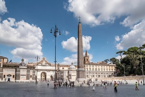 Rome, Italy, August 18, 2016: Tourists in Piazza del Popolo a sunny day of summer. It is a large