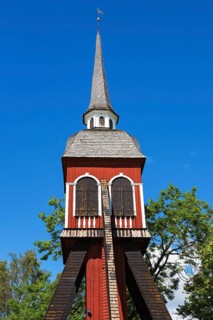 Old wooden belfry in summer