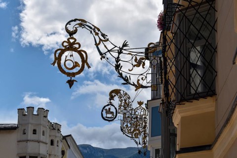Historical notice boards from the Hotel Lamm in the old town of Sterzing, South Tyrol, Italy,
