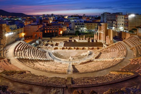 Teatro Romano, blue hour, Roman amphitheater, in the old town of Cartagena, Murcia region, Spain,