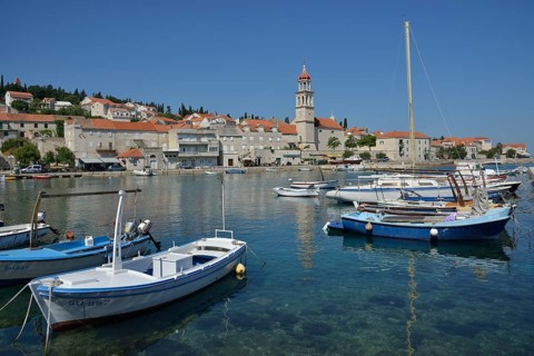 Fishing boats in the harbour in front of the church of Sveti Ivan, St Ivan, Sutivan, Island of