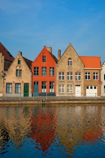 Typical Belgian cityscape Europe tourism concept, canal and old houses on sunset. Bruges (Brugge),