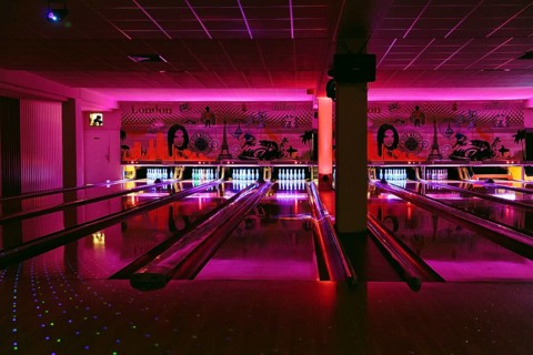 Colourfully illuminated bowling alley, bowling centre, interior, Germany, Europe