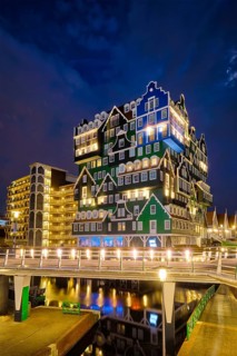 ZAANDAM, NETHERLANDS, MAY 21, 2018: Inntel Hotel in Zaandam illuminated at night. Design of