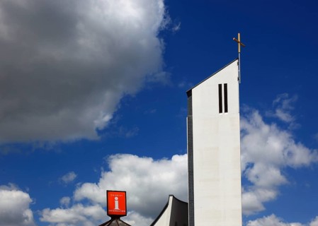 Modern church and notice on tourist information, motorway church St. Christoperus, Himmelkron,