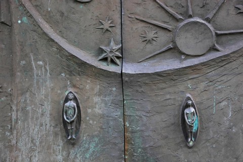 Entrance door with Adam and Eve, St. Boniface, a former free-world ladies' convent with a