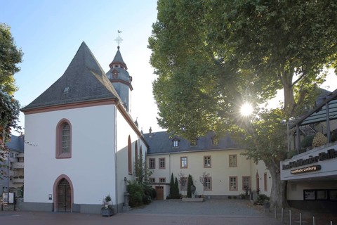Wilhelmiten monastery with St. Wilhelm church or Annakirche in the backlight, old town, Limburg,