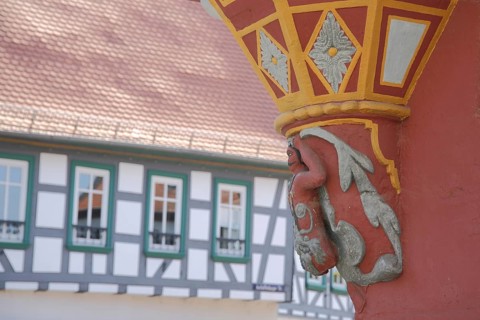 Wood carving with ornamentation on the bay window and half-timbering, detail, Einhardhaus,