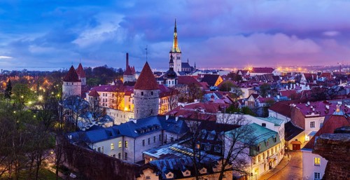 Panorama of aerial view of Tallinn Medieval Old Town with St. Olaf's Church and Tallinn City Wall