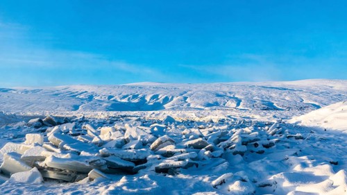 Icefall at the river Skialfandafljot z, near the waterfall Godafoss, snow-covered landscape, North