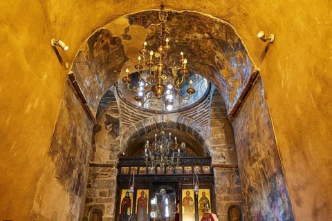 Super wide angle, interior church, icons, tunnel vault, ochre walls, chandelier, altar wall,
