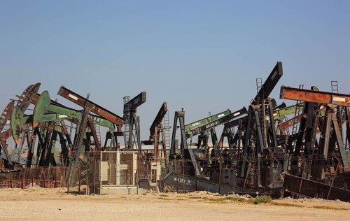 Storage with disused oil pumps near Marmul, Oman, Asia