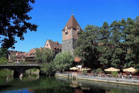 In the historic centre of Nuremberg, houses and restaurant with beer garden on the island of