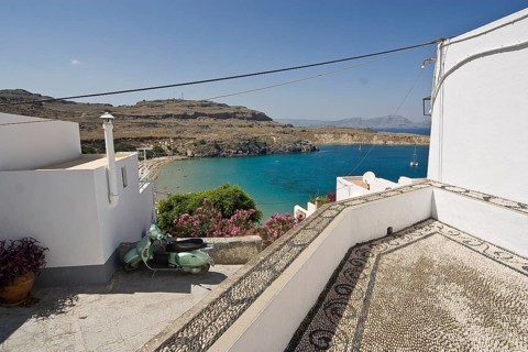 Rhodes Island, Lindos, Lindos is a town on the Greek island of Rhodes. Its landmark is the