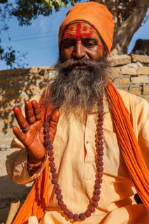 JAISALMER, INDIA, NOVEMBER 28, 2012: Indian sadhu (holy man) blessing. Sadhus are holy men who live