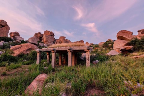 Ancient ruins in Hampi on sunset. Above Hampi Bazaar, Hampi, Karnataka, India, Asia