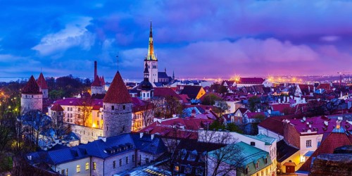Panorama of aerial view of Tallinn Medieval Old Town with St. Olaf's Church and Tallinn City Wall
