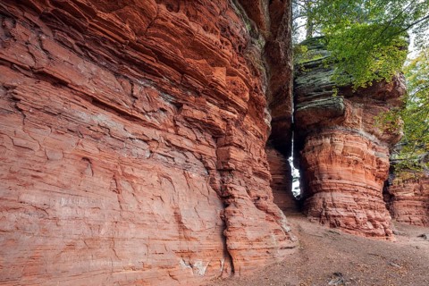 Old castle rock, red sandstone rock formation, natural and cultural monument, Brechenberg near