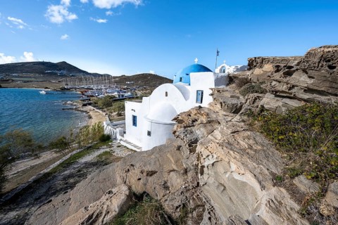 Monastery of Agios Ioannis Detis between rocks on the coast, Paros, Cyclades, Greece, Europe