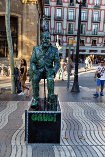 Street performer, mime, living statue of Antoni Gaudi, pedestrian in the city centre, Barcelona,