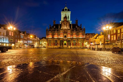 Delft City Hall and Delft Market Square Markt in the evening. Delfth, Netherlands