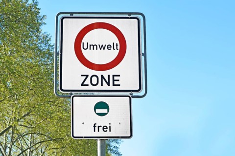 Road traffic sign marking a low emission zone in city centers in Germany translating as