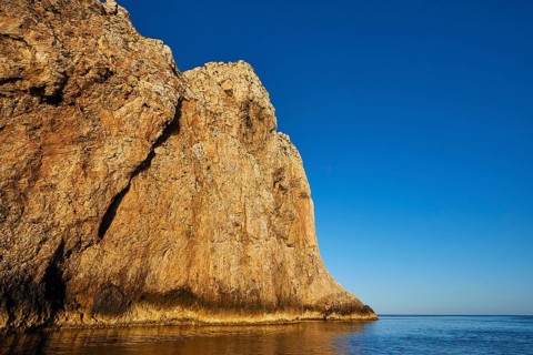 Morning light, Boat tour, View from the sea, Bizarre rock formations, Rugged mountains, Marettimo,