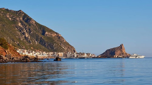 Morning light, luxury yacht, sailing boat, Castello di Punta Troia, harbour, Martettimo town,
