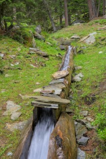 Wooden channel of the Kandelwaal, Martell, South Tyrol, Italy, Europe