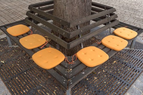 Yellow seat cushions on a park bench, Nuremberg, Middle Franconia, Bavaria, Germany, Europe