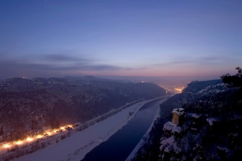 Bastei rock at full moon in winter