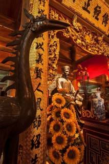 HANOI, VIETNAM, JUNE 11, 2011: Confucius statue at the Temple of Literature. This temple is