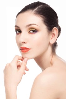 Beauty fashion girl. Portrait of beautiful young woman with fresh clean skin isolated on white