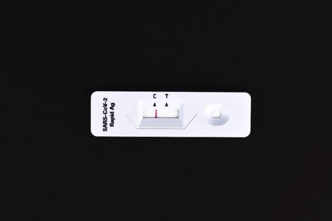 Corona Virus SARS-CoV-2 Rapid Antigen Test with negative result on black background