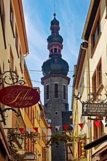Tower of the parish church of St. Martin in a narrow alley in the historic old town, Cochem,