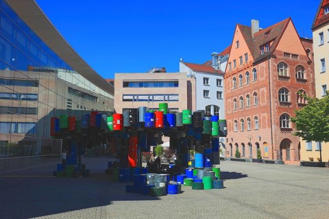 In the historic centre of Nuremberg, art with barrels in front of the Neues Museum Nuremberg,