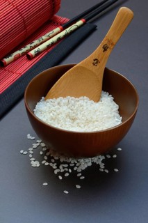 Rice, white rice in bowl with wooden ladle, uncooked
