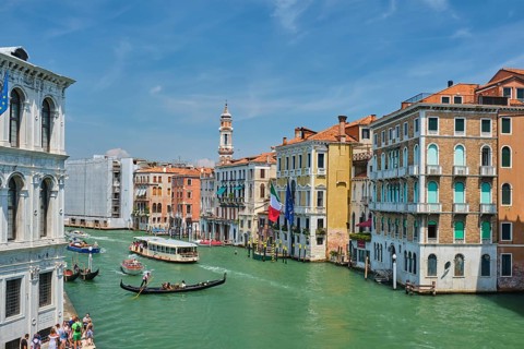 VENICE, ITALY, JULY 19, 2019: Grand Canal with boats and gondolas, Venice, Italy, Europe