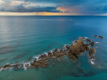The reef Arrecife de las Sirenas in the Nature Reserve Cabo de Gata-Nijar, at sunrise with heavy