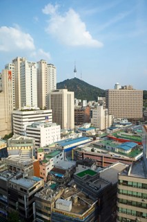 View of the houses of Seoul, in the back the N Seoul Tower on Namsan Hill or South Mountain,
