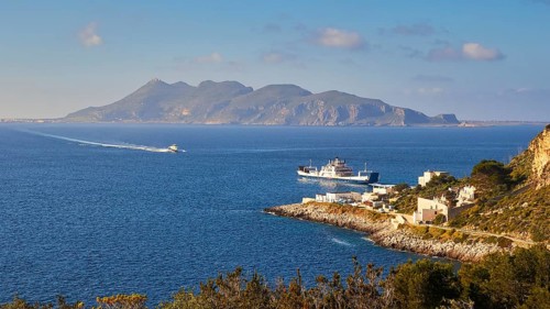 Ship at anchor, hydrofoil, approaching, Levanzo town, Favignana, Levanzo, Egadi Islands, Sicily,