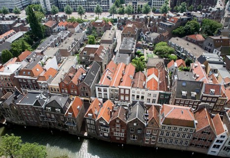 Raised oblique aerial view over historic rooftops in the city centre, Dordrecht, Netherlands
