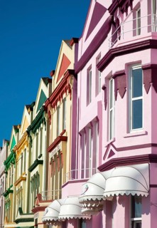 Colourfully painted guesthouses and hotels on the Esplanade, Paignton, Devon, England, United