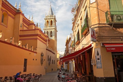 Cafe and alleyway by the Iglesia de Santa Ana, Triana, Seville, Spain, Europe