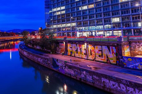 Illuminated footpath along the Danube Canal on Obere Donaustraße, evening mood, Vienna, Austria,