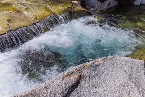Rein da Christallina torrent near Medel. Pools with crystal-clear water in the riverbed. Canton of