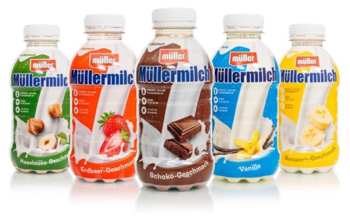 Muller's milk of various flavours in bottles from Theo Müller, cropped against a white background
