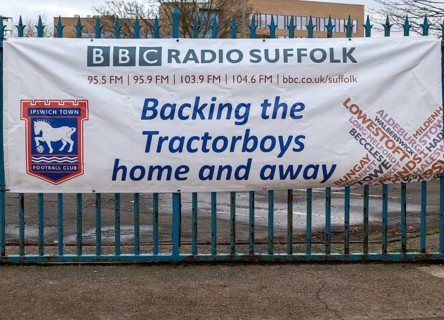 Banner adverting BCC Radio Suffolk support for Ipswich Town football club, Ipswich, Suffolk,