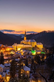 Winter evening in the Müglitz valley, impressively illuminated Weesenstein Castle at the blue hour,